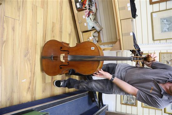 A cello and two bows, cello height 123cm